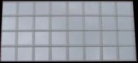Thirty Two 12.5x12.5mm Silver MF11 Mirror Mosaic Tiles Pictured Reflecting the Sky on an Overcast Day